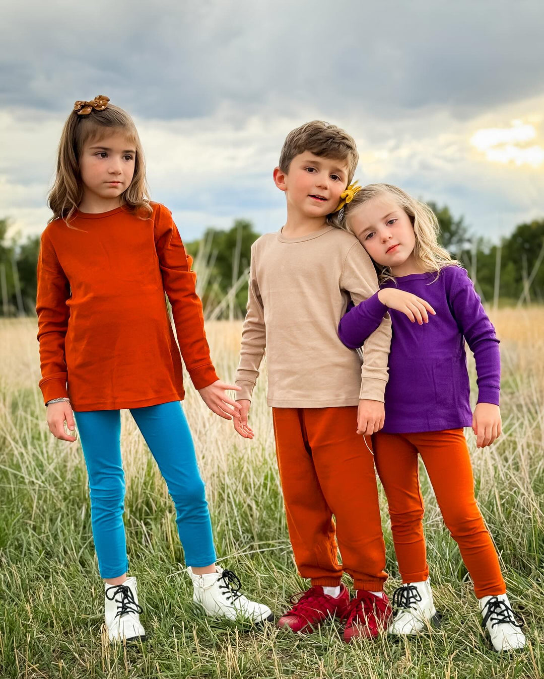 Kids wearing Leveret basics clothes in various solid colors