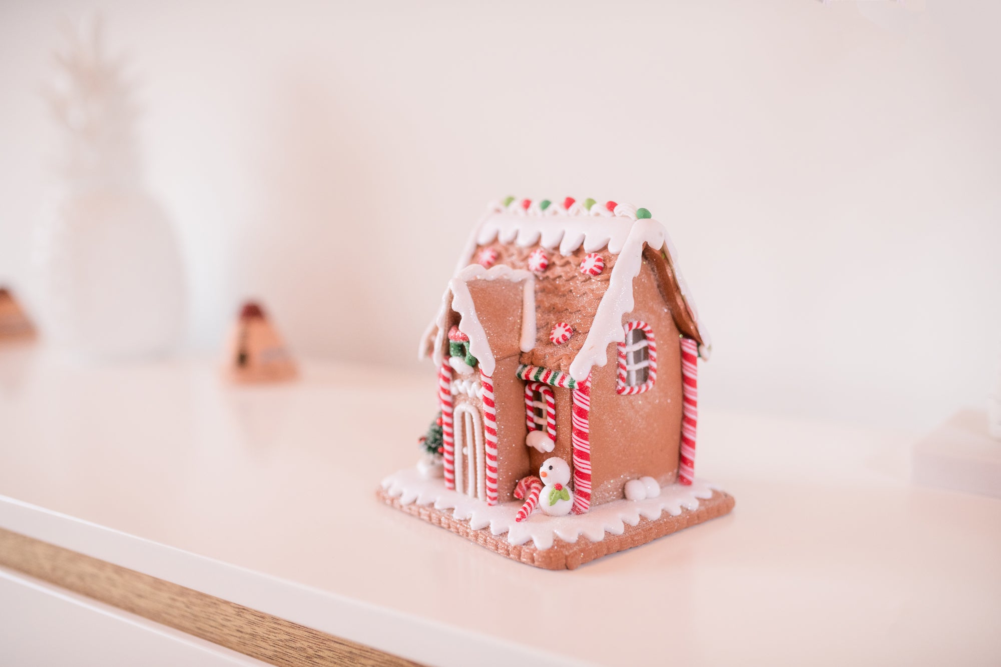 gingerbread house on white table