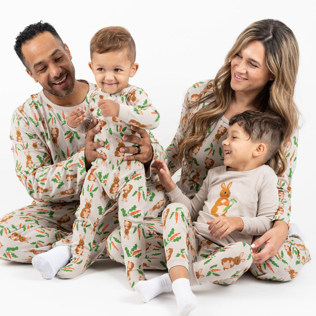family of four wearing matching bunny pajamas