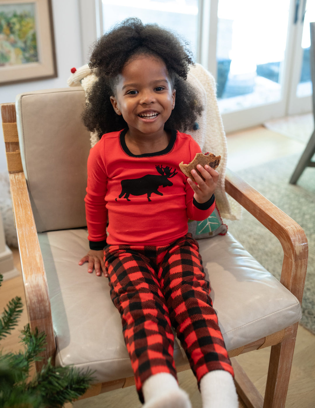 girl in red moose fleece pajamas