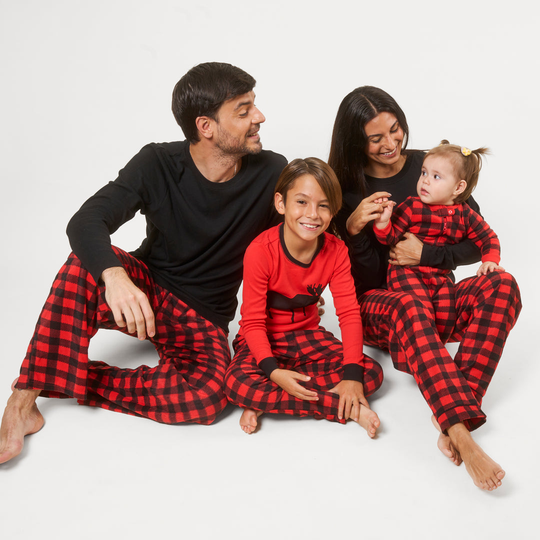 matching family in fleece plaid pajamas
