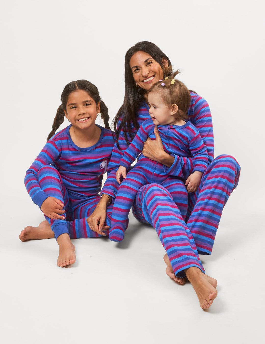 matching family pajamas in purple stripes