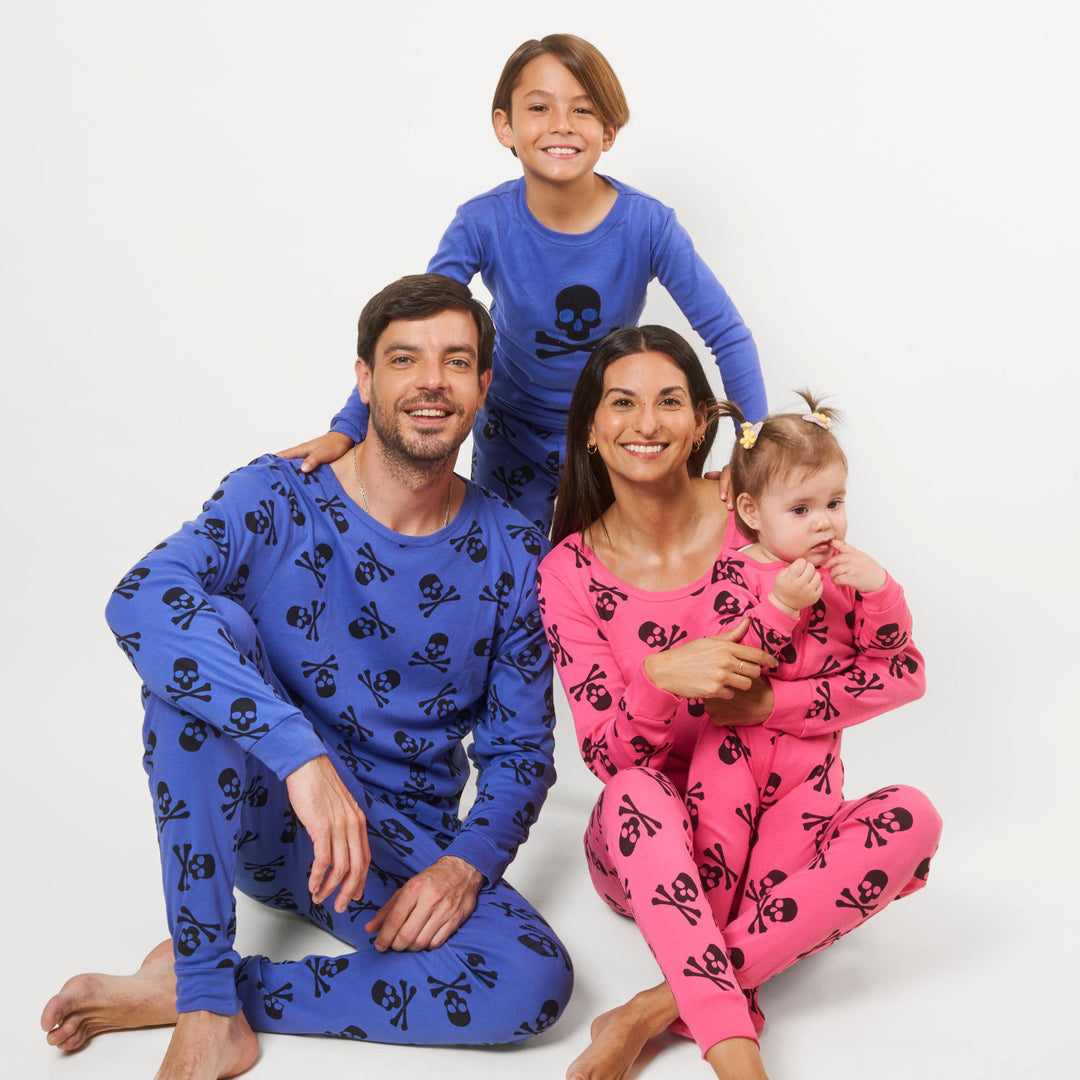 Family in matching family halloween skull pajamas