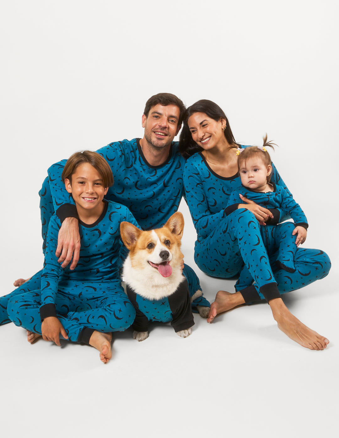 Matching family in moon pajamas 