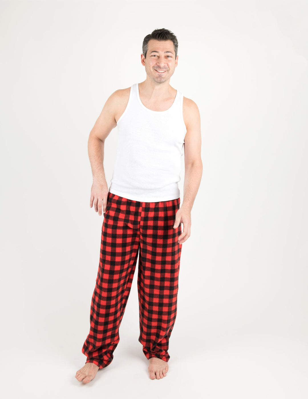 man in black and red plaid fleece pants