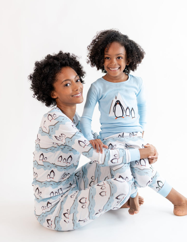 woman and her daughter sitting together in Leveret ocean animals cotton pajamas